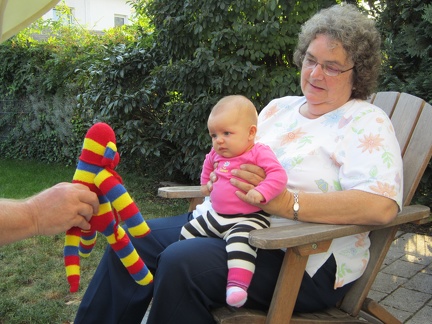 Greta with Grandma Rathburn and her Sock Monkey